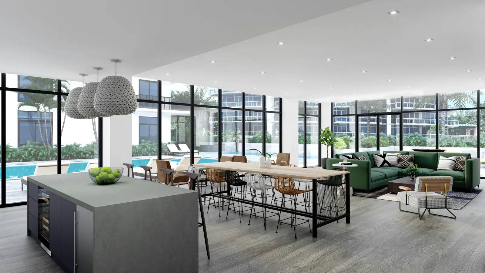 Bright, open-plan living, dining, and kitchen area of a modern South Florida home, with floor-to-ceiling windows overlooking a pool and palm trees